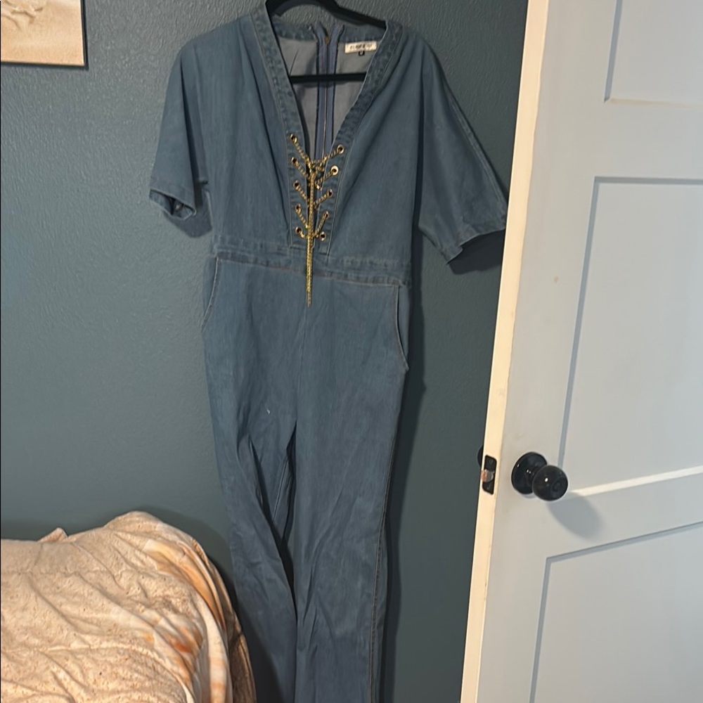 SJS Blue Jumpsuit with Gold Accents